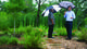 Forster Ndubisi, left, head of the Department of Landscape Architecture and Urban Planning and Jun Hyun Kim, assistant professor of landscape architecture, at the May 2015 dedication of two water gardens at the Schob Nature Preserve. The project was funded by a department minigrant. Three more minigrant-funded projects are scheduled to take place in fall 2015.